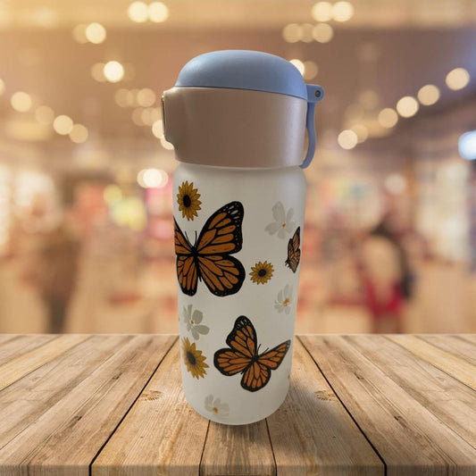 15 oz Frosted Glass Water Bottle with Blue Lid- Flowers and butterflies